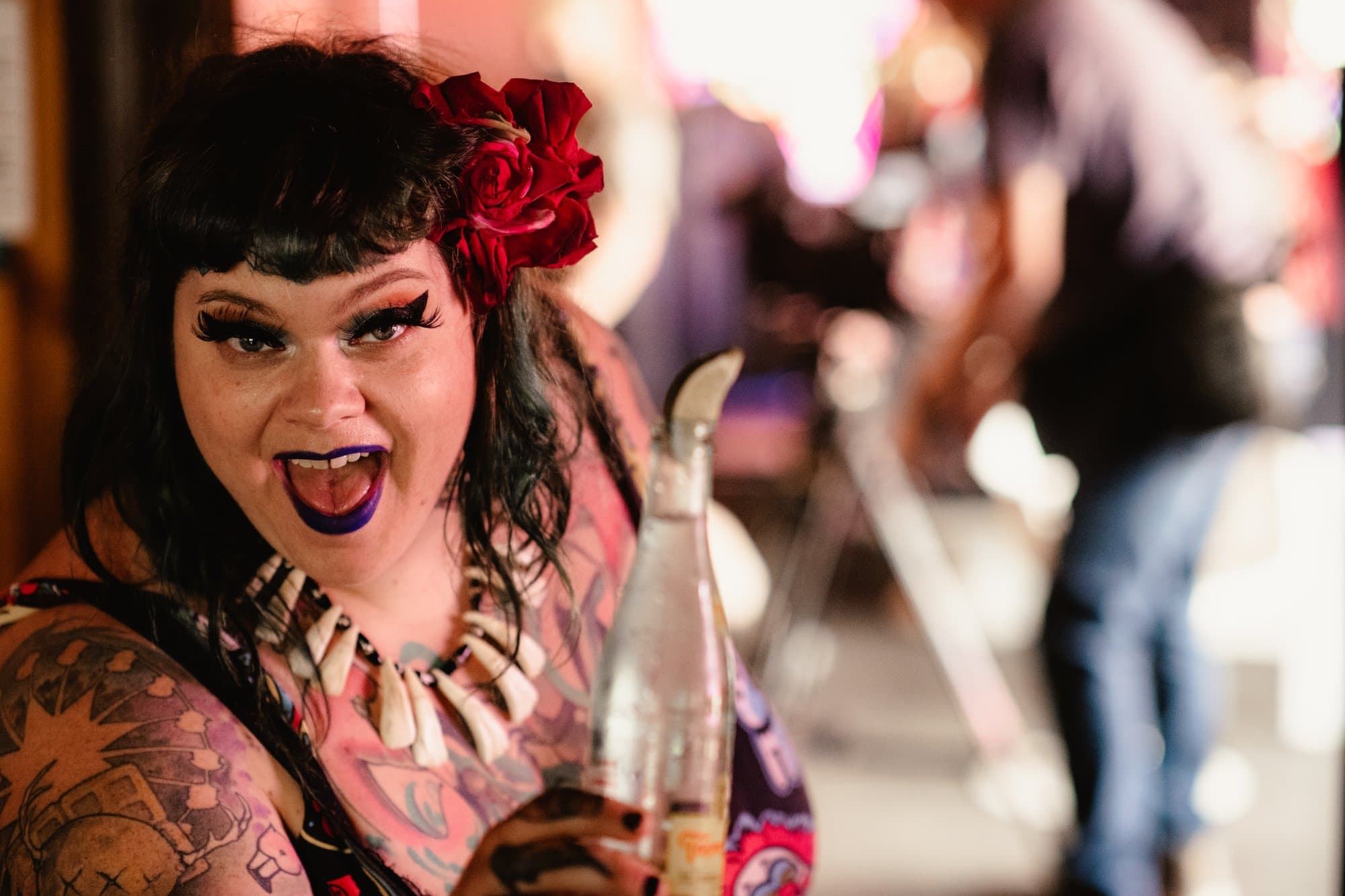 Woman with drink in hand Woman with drink in hand